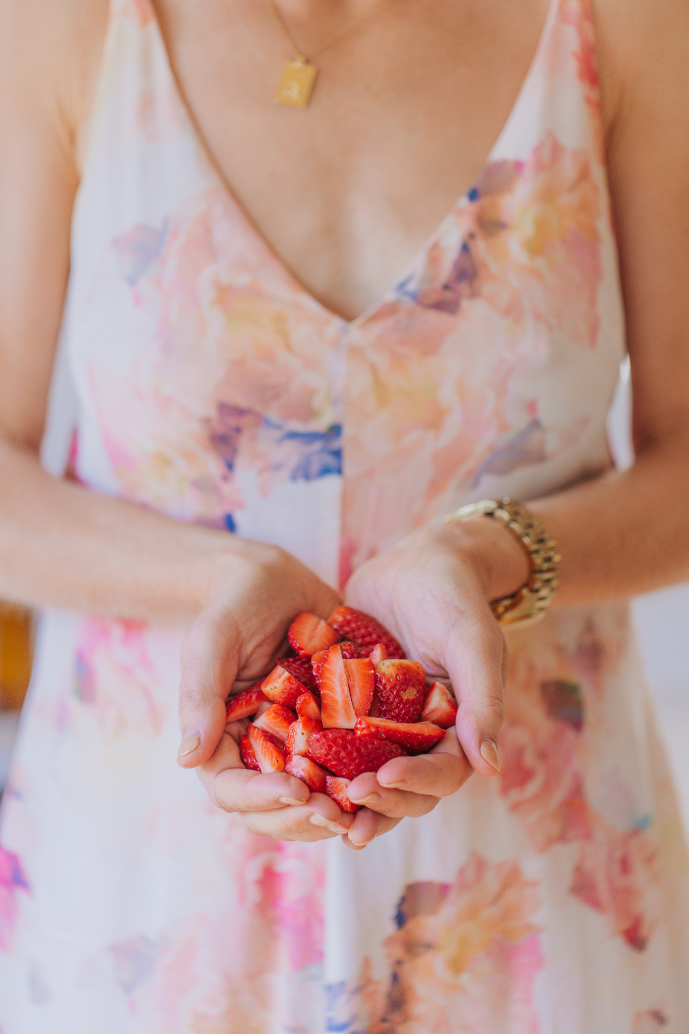 Buffy Ellen from Be Good Organics holding strawberries