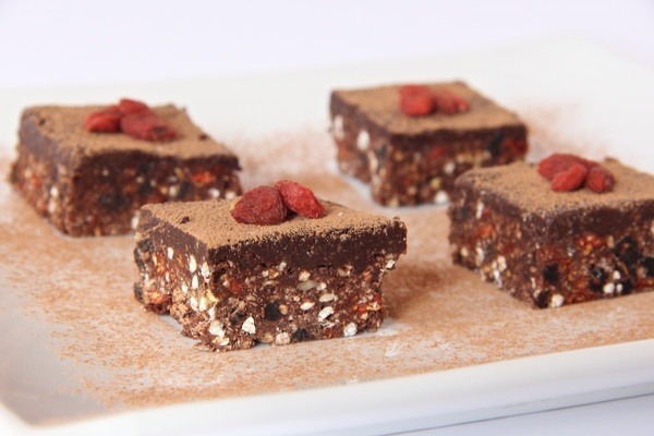 Goji berries are one of my favourite superfoods - so it only makes sense for me to share this Chewy Chocolate Goji Crunch recipe with you - the perfect raw vegan afternoon treat. By Buffy Ellen from Be Good Organics