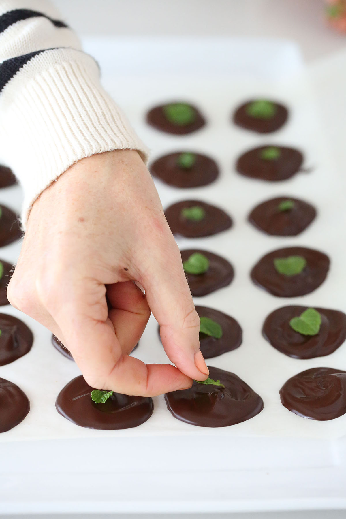 Chocolate mint buttons, these are drops of dark chocolate mint bliss. Made with just 2 ingredients - dark dairy free chocolate and pure peppermint essential oil, they’re vegan and low sugar too.