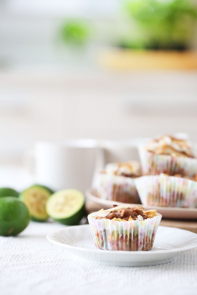 Fruity muffins by Buffy Ellen with toasted coconut on top and feijoas in background