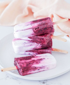 Fresh berries and dairy free coconut yoghurt, blended into an easy 5 minute, 5 ingredient ice cream popsicle. Good for the kids, and adults too! Healthy, easy, and super low in sugar.