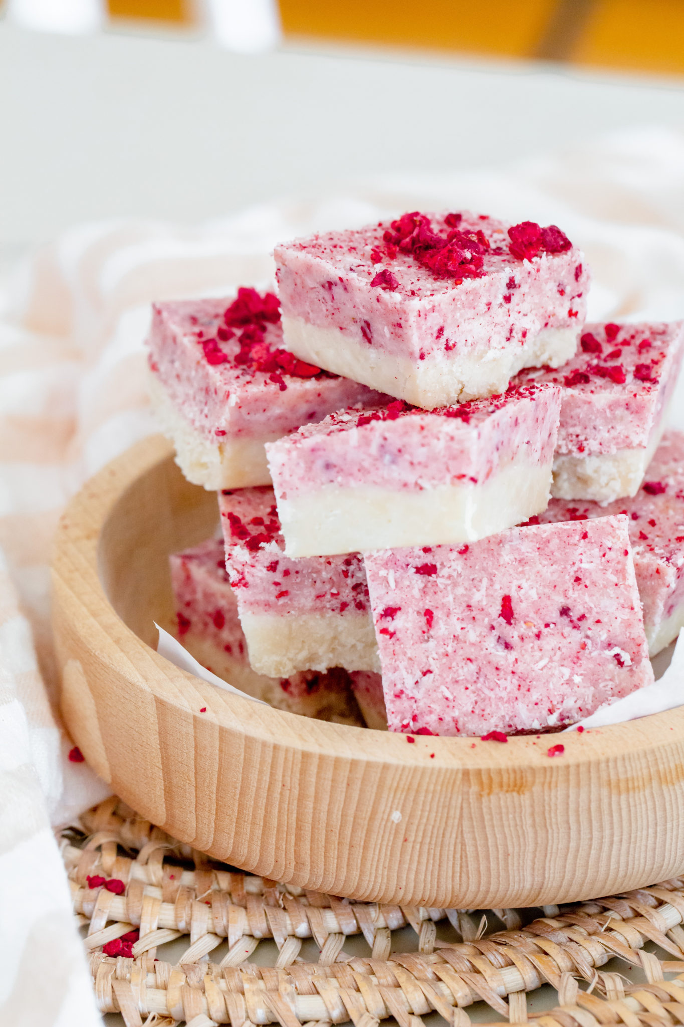 bowl with pink and white squares of coconut ice